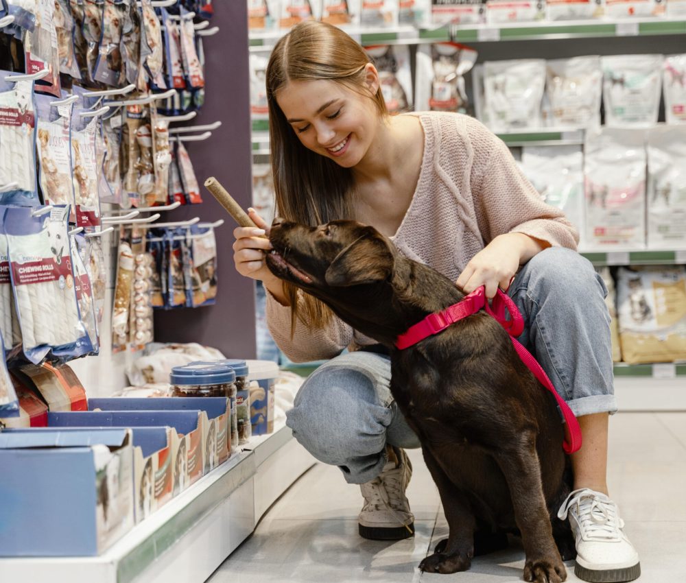 adorable-dog-with-owner-pet-shop