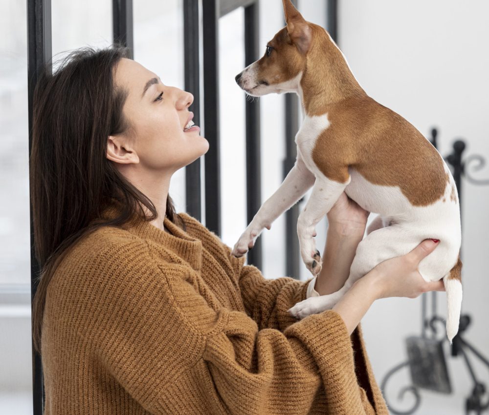 side-view-woman-posing-with-her-dog